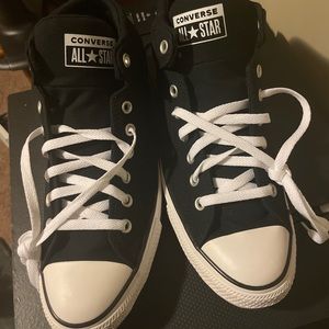 Chuck Taylor’s hi-top converse